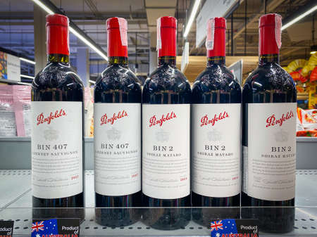 Bangkok Thailand - 21 Jan 2022: Bottles of Penfolds wine on shelf for sale in the Top supermarketのeditorial素材
