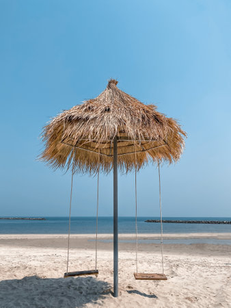 Bamboo umbrella on the beach in Chonburi Thailandの写真素材