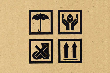 Caution symbol on brown Packaging paperの写真素材