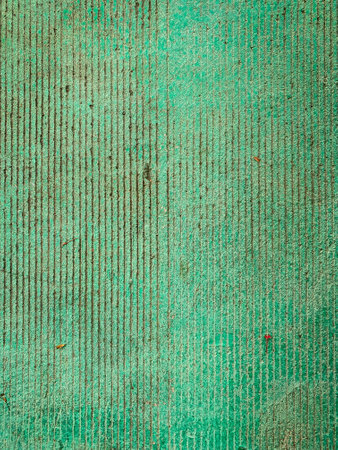 Cement floor with dirty on the green floor as the background imageの写真素材