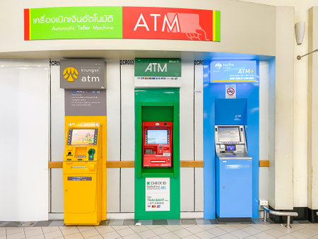 Samutprakan Thailand: 03-12-2022: Some people get money from ATM machines at Big-C Supermarketのeditorial素材