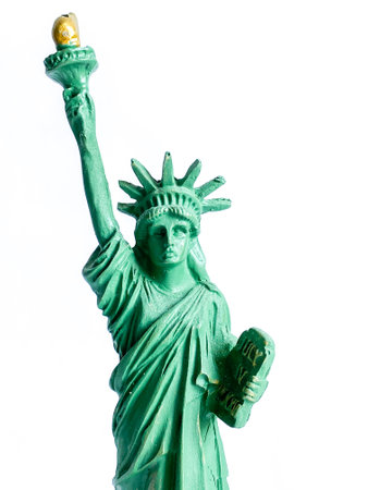 Small Liberty Statue souvenir on white background, a landmark of New York cityの写真素材
