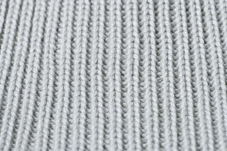 white knitted fabric as a background. close-up, macro