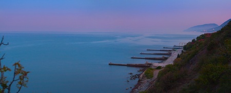 sea embankment at sunsetの写真素材