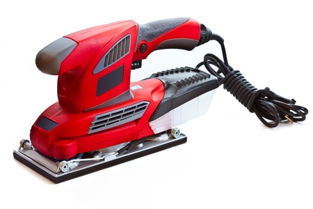 Electric sandpaper tool for home handyman use, isolated over whiteの写真素材