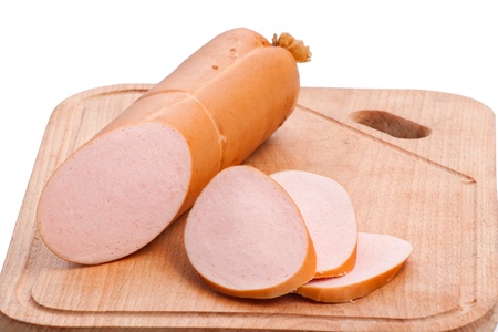 Meat delicatessen on the board isolated on the white の写真素材