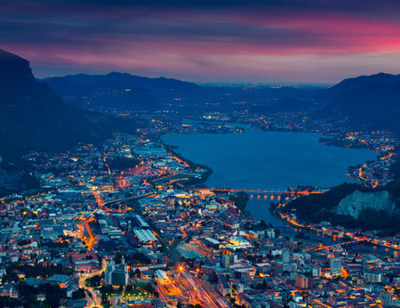 Night view of the city Lecco  and Lake Garlate, Alps, Italy.の写真素材