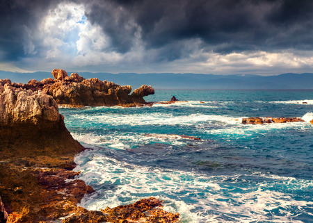 Stormy weather on the volcanic beach on nature reserve Piscina di Venere, cape Milazzo, Sicily, Italy, Tyrrhenian sea, Europe.の写真素材