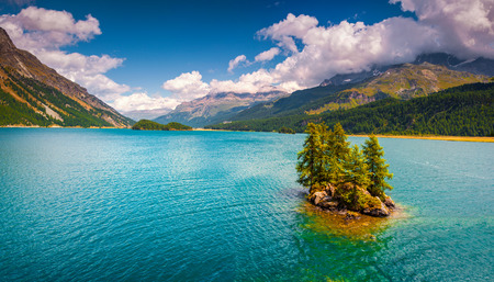 Small island on the Silsersee lake in the Swiss Alps. Segl, Switzerland, Europe.の写真素材