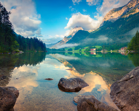 Misty summer morning on the Hintersee lake in Austrian Alps. Austria, Europe.の写真素材