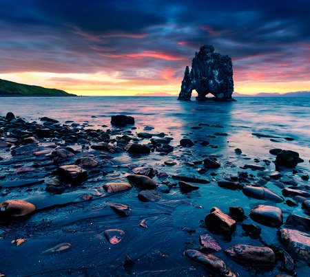 Huge basalt stack Hvtserkur on the eastern shore of the Vatnsnes peninsula. Colorful summer sunrise in northwest Iceland, Europe. Artistic style post processed photo.の写真素材