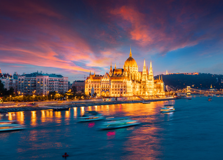 Colorful evening view of Parliament and Chain Bridge. Dramatic sunset in Budapest, Hungary, Europe. Artistic style post processed photo.の写真素材