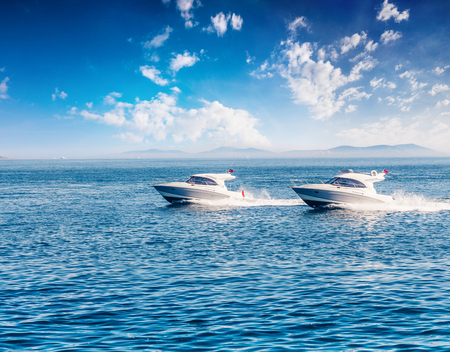 Entertaining cruise on a motor boat in the Bosporus Strait. Beautiful seascape on the Sea of Marmara, Istanbul, Turkey, Europe. Active tourism concept background.の写真素材