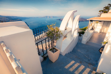 Sunny morning view of Santorini island. Picturesque spring scene of the  famous Greek resort Thira, Greece, Europe. Traveling concept background.の写真素材