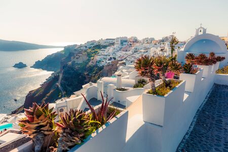 Picturesque morning view of Santorini island. Fantastic spring scene of the famous Greek resort Thira, Greece, Europe. Traveling concept background.の写真素材