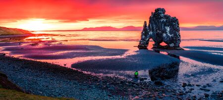 Huge basalt stack Hvitserkur on the eastern shore of the Vatnsnes peninsula. Colorful summer sunrise...