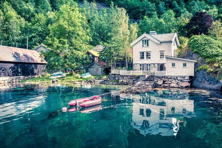 Bright summer scene of Geiranger town, western Norway. Splendid view of Sunnylvsfjorden fjord. Traveling concept background.の写真素材