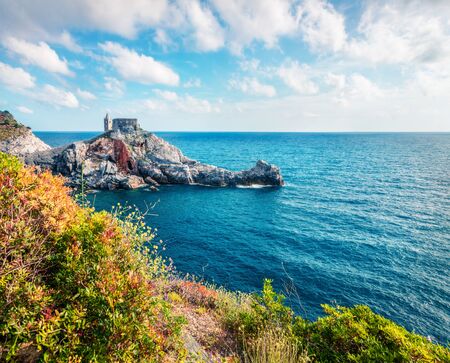 Attractive morning view of Saint Peter Church in Portovenere town. Picturesque spring seascape of...
