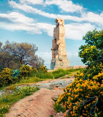Great spring view of Monument of Philopappos. Colorful morning scene in Athens, Greece, Europe. Treveling concept background. Artistic style post processed photo.の写真素材