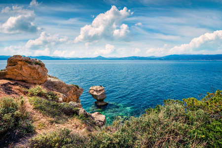 Sunny spring view of West Court of Heraion of Perachora, Limni Vouliagmenis location. Colorful...