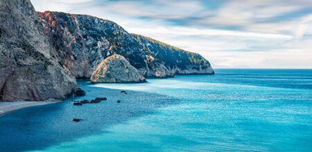 Panoramic spring view of Porto Katsiki Beach. Picturesque morning seascape of Ionian sea. Amazing outdoor scene of Lefkada Island, Greece, Europe. Beauty of nature concept background.の写真素材