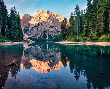Majestic morning view of Braies (Pragser Wildsee) lake. Splendid summer sunrise in Fanes-Sennes-Braies national park, Dolomiti Alps, South Tyrol, Italy, Europe. Beauty of nature concept background.の写真素材