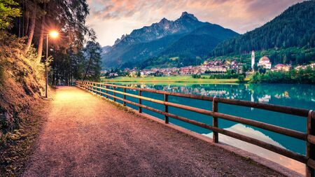 Splendid sunset scene of Santa Caterina lake. Great summer view of Auronzo di Cadore / Aulus-les-Bains resort, Province of Belluno, Italy, Europe. Traveling concept background.の写真素材