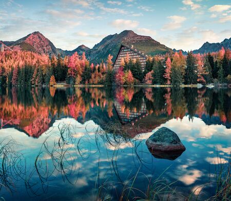Stunning autumn view of Strbske pleso lake. Picturesque morning scene of High Tatras National Park,...