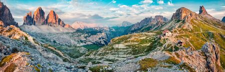 Impressive summer morning in Tre Cime Di Lavaredo National park. Panoramic summer view of rifugio Locatelli in Dolomiti Alps, South Tyrol, Italy, Europe. Beauty of nature concept background.の写真素材