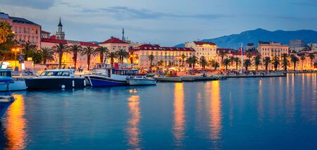 Panoramic evening cityscape of Split town. Splendid summer sunset in Croatia, Europe. Beautiful world of Mediterranean countries. Traveling concept background.の写真素材