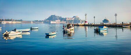 Panoramic morning view of the old Venetian fortress in Kerkira, capital of Corfu island. Sunny...