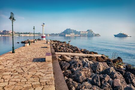 Attractive morning view of the old Venetian fortress in Kerkira, capital of Corfu island. Sunny...
