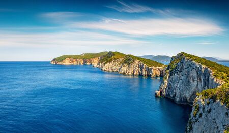Aerial morning seascape of Ionian Sea. Blue summer view of the west coast of Lefkada island, Greece, Europe. Beauty of nature concept background.の写真素材