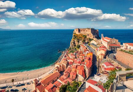 Sunny morning view of Scilla town with Ruffo castle on background, administratively part of the...