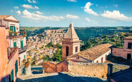 Sunny spring cityscape of Ragusa town with Church of St Mary of the Stairs on background. Wonderfulmorning scene of Sicily, Italy, Europe. Traveling concept background.の写真素材