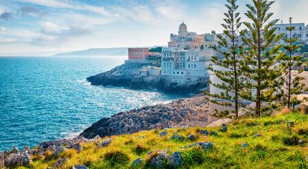 Panoramic spring cityscape of Santa Cesarea Terme - town and comune in the province of Lecce, Apulia, southern Italy, europe. Superb afternoon seascape of Adriatic sea. Traveling concept background.の写真素材
