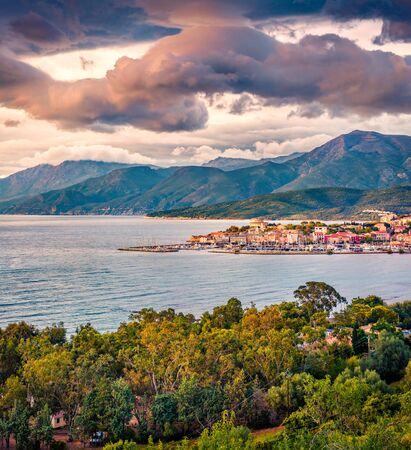 Dramatic spring view of Saint-Florent port, Haute-Corse department of France, Europe. Gorgeous sunset on Corsica island. Colorful seascape of Mediterranean sea. Traveling concept background.の写真素材