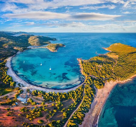 View from flying drone. Exotic spring view of Rondinara beach. Exciting morning seascape of...