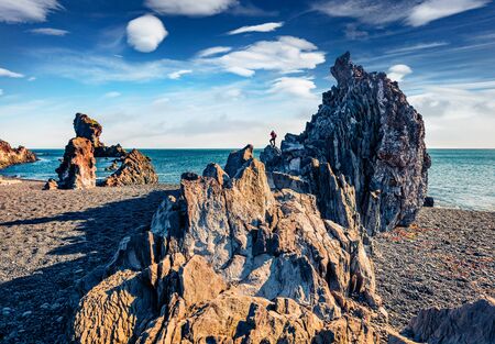 Gorgeous morning view of popular tourist attraction - Djupalonssandur beach. Fantastic summer scene of west Iceland, Europe. Beauty of nature concept background.の写真素材