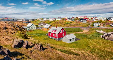 Sunny summer cityscape of small fishing town - Stykkisholmur. Stunning morning scene of west Iceland, Europe. Traveling concept background.の写真素材