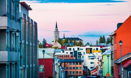 Nice evening cityscape of  Reykjavik with tower of Hateigsvegur technological institute on background. Colorful sunset on Iceland, Europe. Traveling concept background.
の写真素材