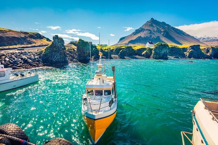 Stunning morning view of small fishing village at the foot of Mt. Stapafell - Arnarstapi or Stapi....