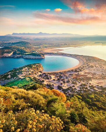 Aerial summer view of Voidokilia beach from Navarino Castle. Splendid sunrise on Ionian Sea, Pylos town location, Peloponnese, Greece, Europe. Beauty of nature concept background.の写真素材