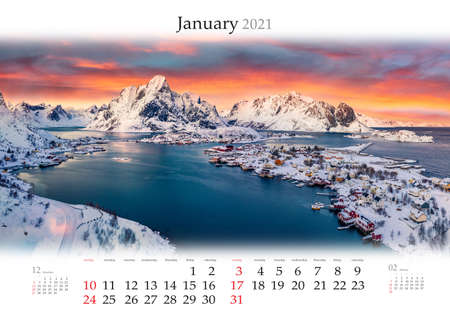 Calendar January 2021, B3 size. Set of calendars with amazing landscapes. Fantastic winter view of Lofoten islands, Norway, Europe. Frosty sunset on Norwegian sea.の写真素材