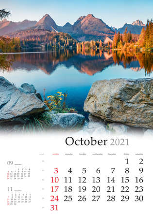Calendar October 2021, vertical B3 size. Set of calendars with amazing landscapes. Exciting autumn view of Strbske pleso lake. Gorgeous evening scene of High Tatras National Park, Slovakia, Europe.の写真素材