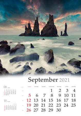 Calendar September 2021, vertical B3 size. Set of calendars with amazing landscapes. Gorgeous morning scene of black sand beach in Iceland, Vik location, Europe. Sunrise on Reynisdrangar cliffs.の写真素材