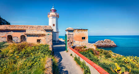 Superb morning view of Zafferano cape with old lighthouse. Wonderful summer seascape of Mediterranean sea, Sicily, Italy, Europe. Traveling concept background.の写真素材