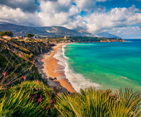 Dramatic morning view of popular italian destination - Guidaloca beach, Scopello location, Sicily, Europe. Incredible summer seascape of Mediterranean sea, Italy.の写真素材