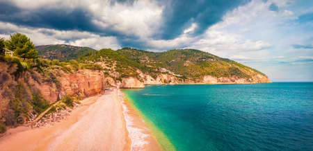 Attractive summer view of popular tourist destination - Mattinatella beach (Fontana delle Rose). Bright morning seascape of Adriatic sea, Gargano National Park, Italy, Europe.の写真素材