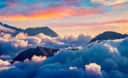Spectacular sunrise scene of Val di Fassa valley. Impressive morning view from Sella pass of Dolomite Alps, Italy, Europe. Beauty of nature concept background.の写真素材